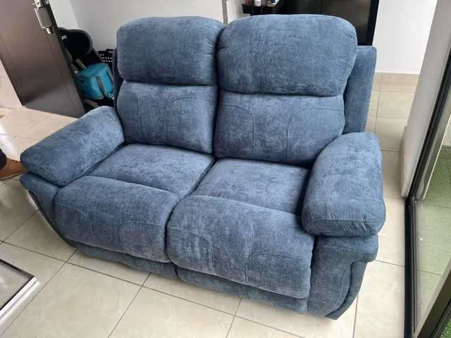 Sillón reclinable doble en gris azulado